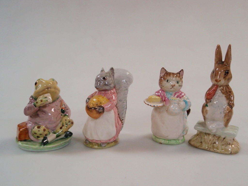 Appraisal: Four Beswick Beatrix Potter figures Goody Tiptoes Mr Jeremy Fisher