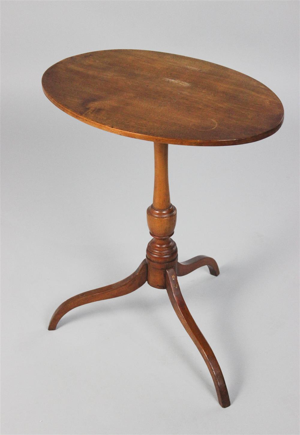 Appraisal: NEW ENGLAND FEDERAL CHERRYWOOD CANDLESTAND the hinged oval on an