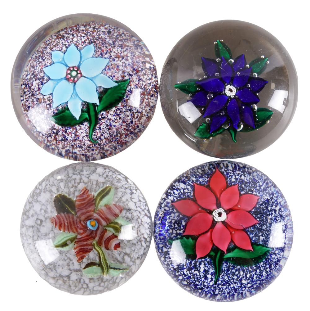 Appraisal: FOUR FLORAL LAMPWORK PAPERWEIGHTSeach unsigned comprising three on a colored