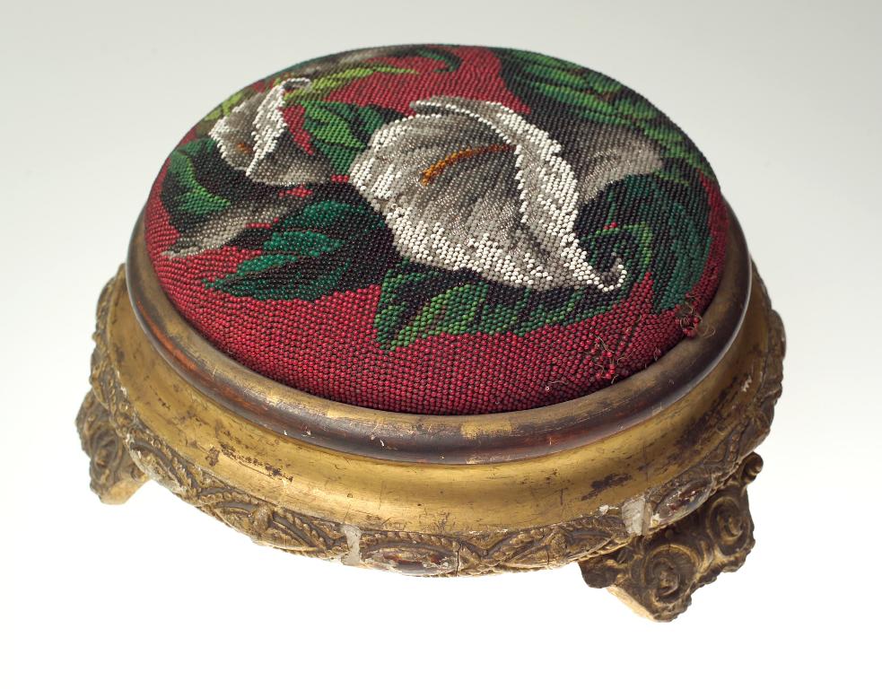 Appraisal: VICTORIAN GILTWOOD AND BEADWORK FOOTSTOOL the beadwork depicting lilies against