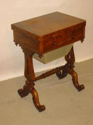 Appraisal: A MID VICTORIAN BURR WALNUT WORK TABLE of rounded oblong