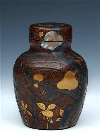 Appraisal: A JAPANESE WOODEN TEACADDY with overlaid gilt mother of pearl