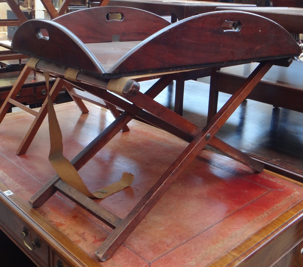 Appraisal: A George III drop flap mahogany butlers tray with pierced