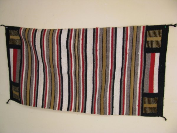 Appraisal: North American Indian saddle blanket with black red brown and