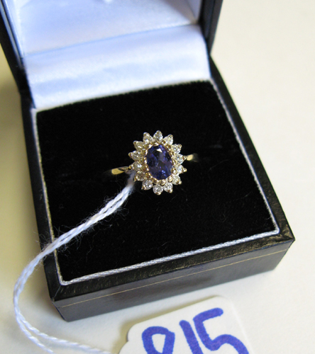 Appraisal: TANZANITE DIAMOND AND FOURTEEN KARAT GOLD RING centered and prong