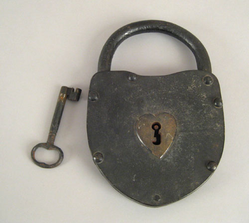 Appraisal: Massive cast iron padlock th c with heart escutcheon h