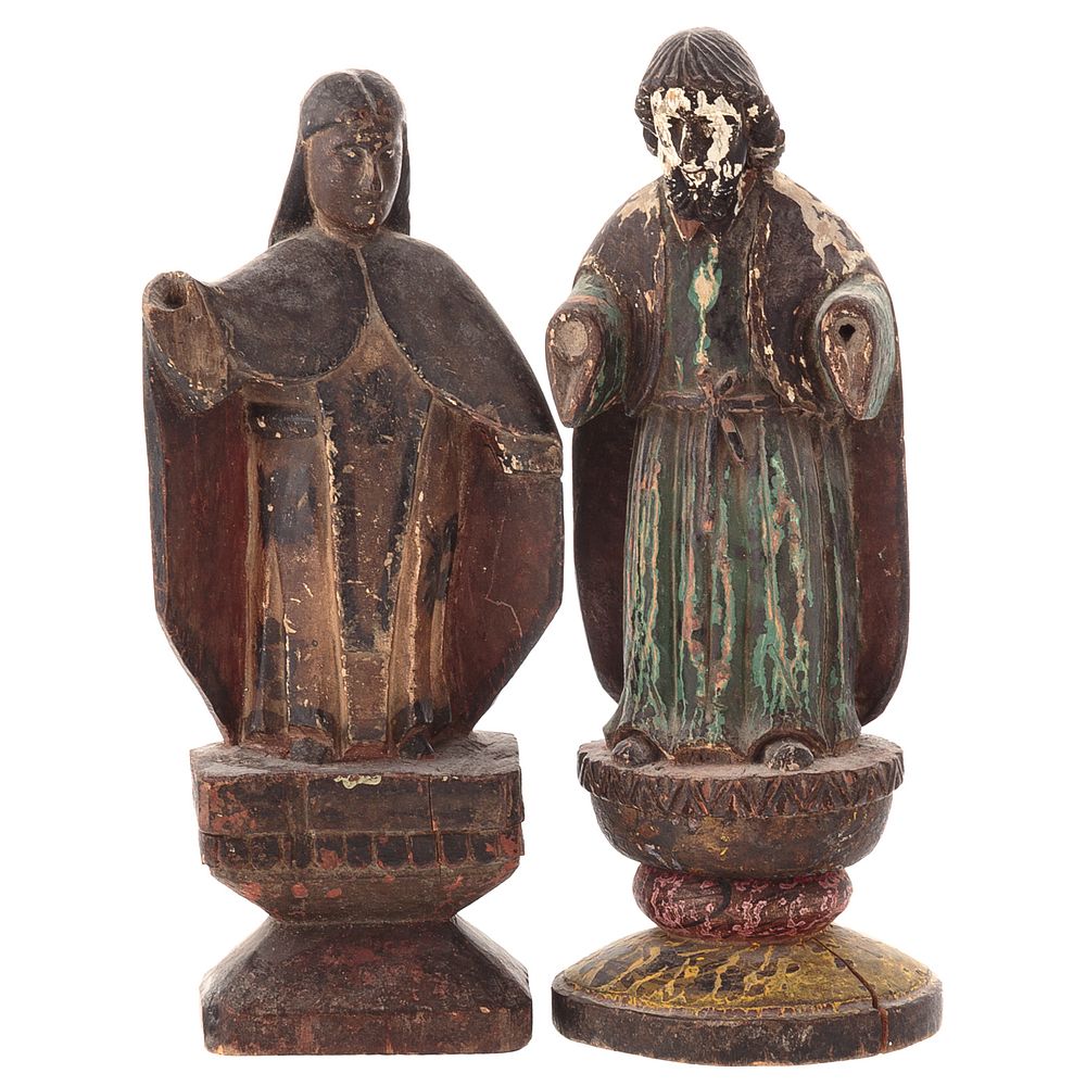 Appraisal: Two Spanish Colonial Carved Wood Santos Carved and polychromed figures