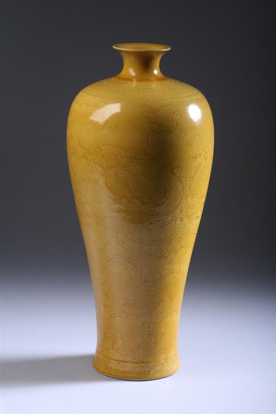 Appraisal: CHINESE YELLOW GLAZED PORCELAIN VASE th century With incised dragon