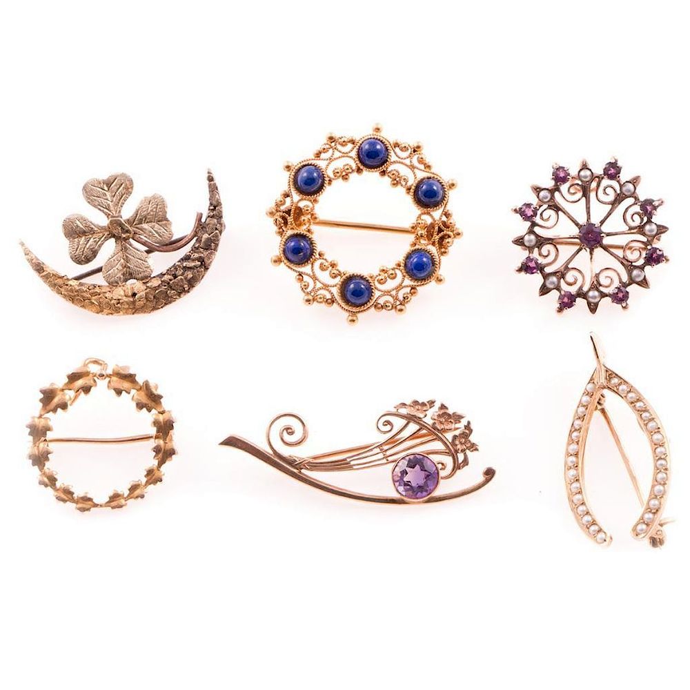 Appraisal: Six antique and vintage brooches in k k and k