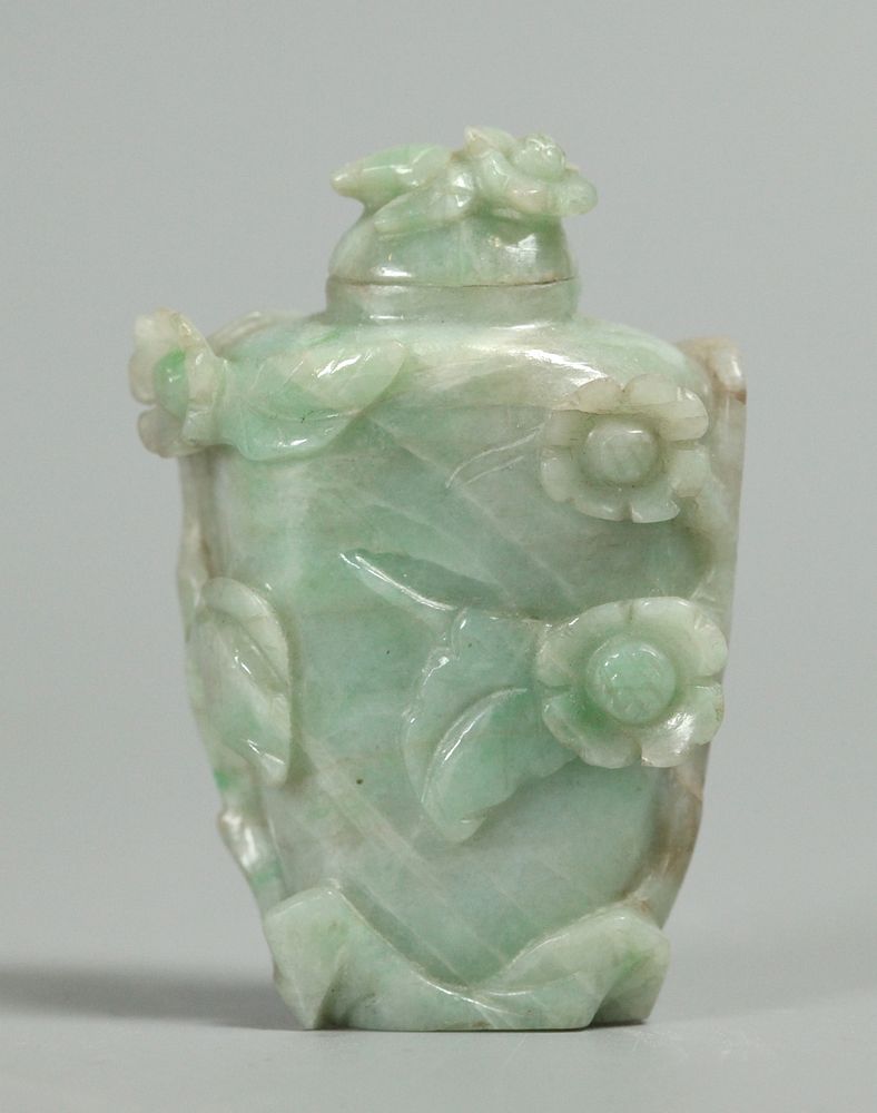 Appraisal: Chinese jadeite snuff bottle carved in relief Notice to bidders