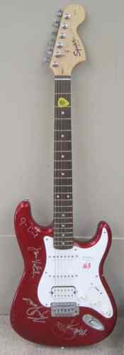 Appraisal: MAROON BAND AUTOGRAPHED FENDER SQUIRE STRAT GUITAR a red electric