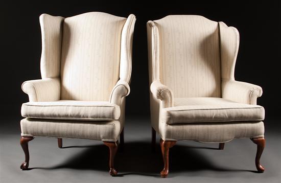 Appraisal: Chippendale style cherrywood upholstered wing chair and matching upholstered Queen