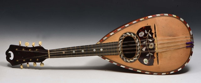 Appraisal: AN ITALIAN MANDOLIN with mother of pearl inlay by Ferrari