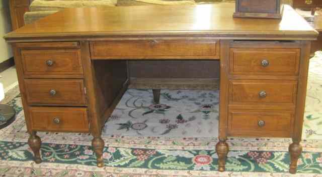 Appraisal: WALNUT OFFICE DESK American c 's having a rectangular flat