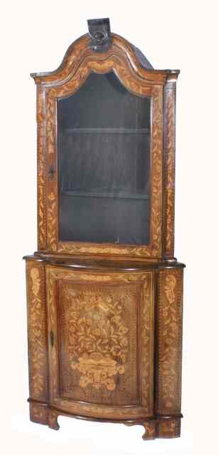 Appraisal: AN ANTIQUE DUTCH MARQUETRY CORNER CABINET the shaped cornice above