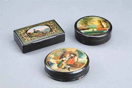 Appraisal: THREE DECORATED SNUFF BOXES European th century lacquered papier mache