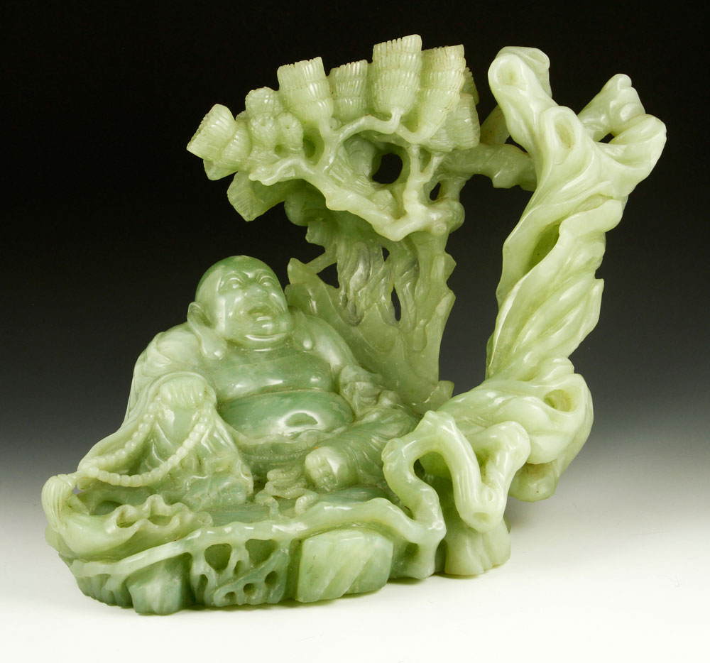 Appraisal: - Chinese Green Hard Stone Buddha Chinese carved figure of