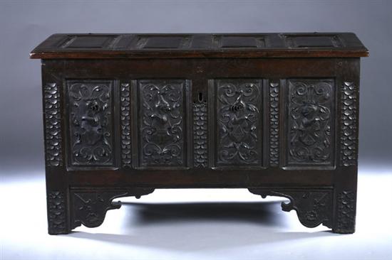 Appraisal: ENGLISH OAK CARVED-PANEL DOWER CHEST th century Four-panel lid opening