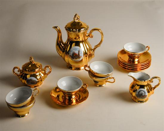 Appraisal: A Gold Finished Porcelain Tea Service unmarked possibly Picard to