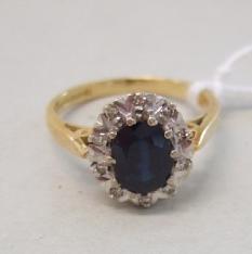 Appraisal: An ct gold sapphire and diamond set cluster ring claw