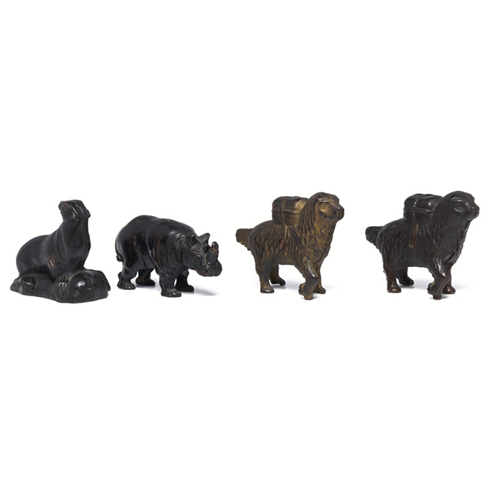 Appraisal: Americana banks four panther rhinoceros and two dogs molded metal