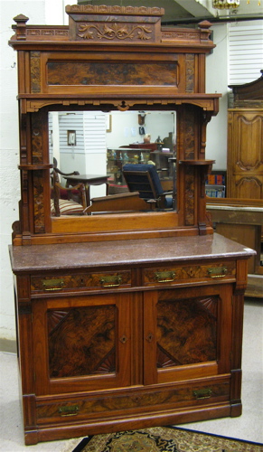 Appraisal: VICTORIAN WALNUT AND BURL WALNUT SIDEBOARD American c The back