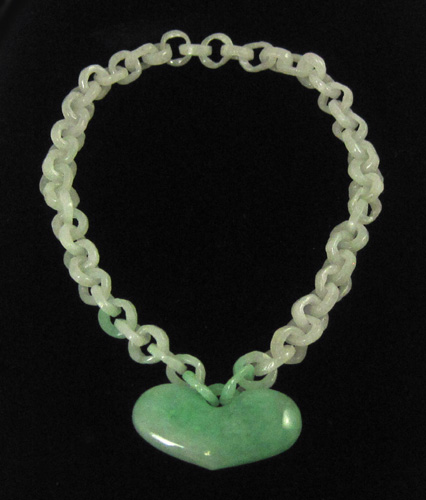 Appraisal: LIGHT GREEN JADE CHAIN BRACELET with jade chain links and