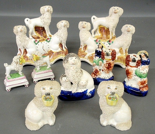 Appraisal: - Nine pieces of English Staffordshire dog figures largest pair