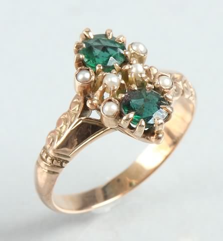 Appraisal: K gold ring with green garnet and glass doublets and