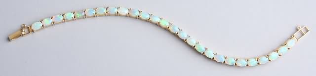 Appraisal: KY gold and opal bracelet l excluding clasp S