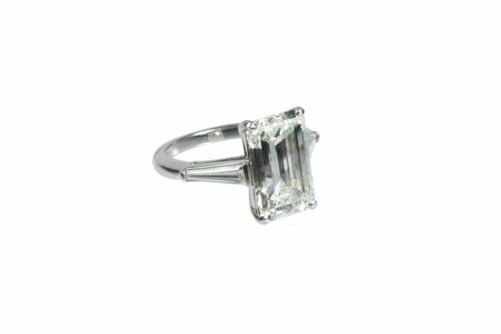 Appraisal: LADY'S RING - One contemporary style platinum ring centered with