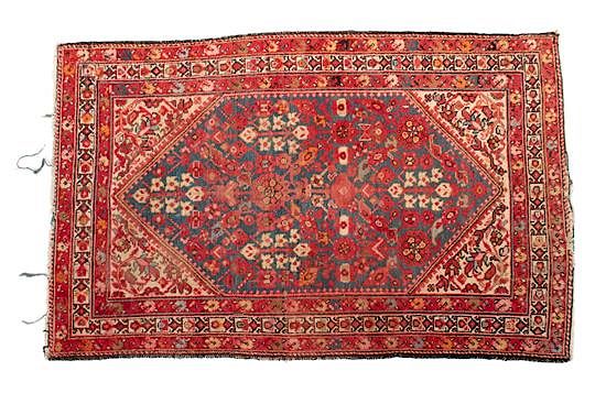 Appraisal: A Caucasian Rug A Caucasian Rug Approximately x inches Estimate