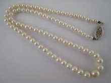 Appraisal: A graduated cultured pearl necklace the pearls graduated between approx