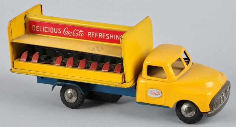 Appraisal: Friction Coca-Cola Truck Toy Description Displays very well Dusty with