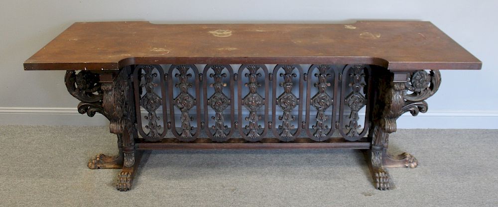 Appraisal: Antique Library Table with Highly Carved Base From a Harrison