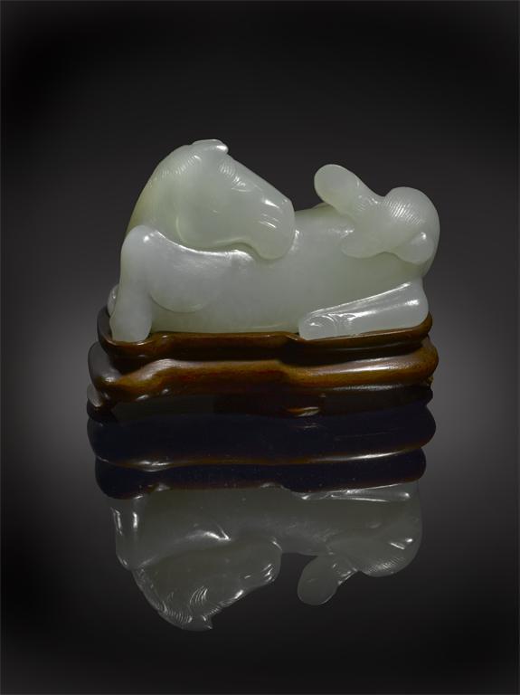 Appraisal: A fine Chinese white jade model of a rolling horse