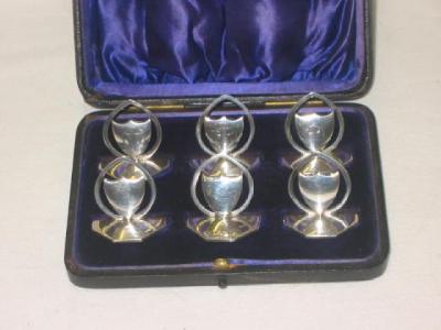 Appraisal: A SET OF SIX EDWARDIAN MENU HOLDERS modelled as blank