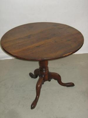 Appraisal: A GEORGE III OAK AND ELM TRIPOD TABLE the circular