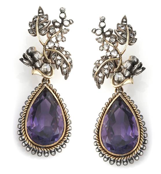 Appraisal: A pair of amethyst diamond and silver-topped gold earrings