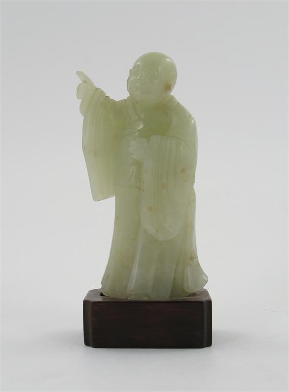 Appraisal: A Chinese pale celadon jade carving of a figure