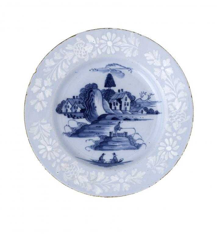 Appraisal: A BRISTOL DELFTWARE PLATE painted in cobalt with a Chinese