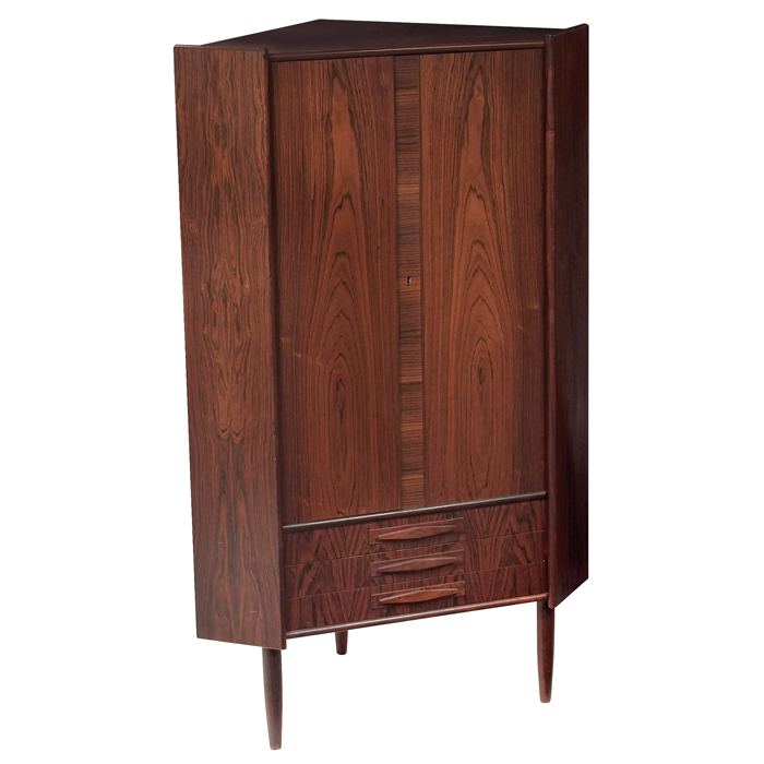 Appraisal: Danish rosewood corner cabinet rosewood two locking doors concealing shelves