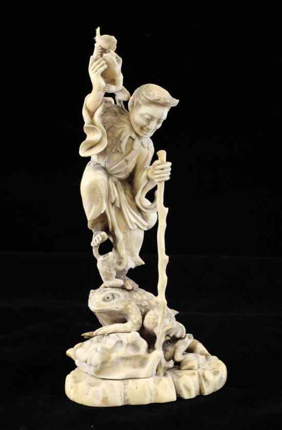 Appraisal: A Japanese ivory and marine ivory figure of Gama Sennin