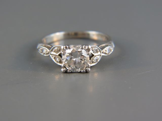 Appraisal: Diamond Ring carat round brilliant in platinum setting six smaller