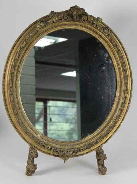 Appraisal: A gilt gesso framed easel type circular mirror cm high