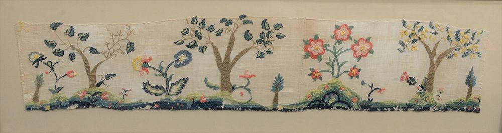 Appraisal: Framed Embroidered Crewelwork on linen fragment bedspread having embroidered trees