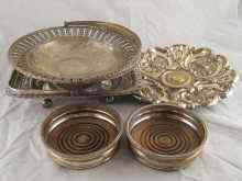 Appraisal: A quantity of silver plate comprising a pair of coasters