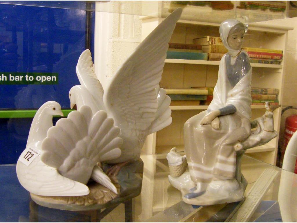 Appraisal: Lladro character group modelled as two entwined doves together with