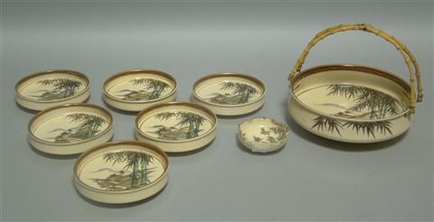 Appraisal: EARTHENWARE SERVING DISH AND BOWLS Decorated in the Satsuma style