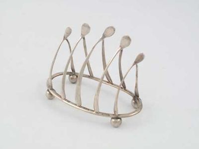 Appraisal: An Edwardian novelty toast rack in the form of a